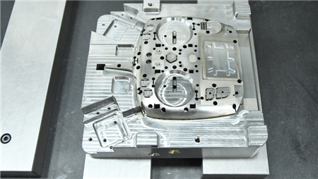 What should be done when there is a sharp edge in the processing of injection molds?